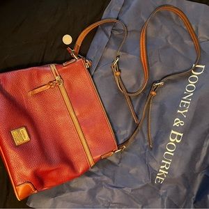 Beautiful Dooney and Burke Red Pebble leather Crossbody Bag.